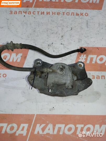 Суппорт тормозной передний правый Nissan Teana J32