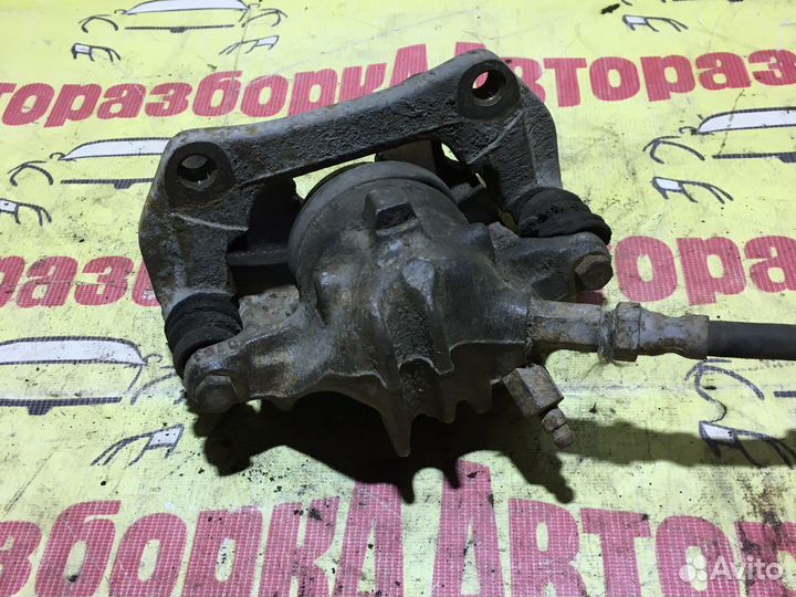 Суппорт тормозной Volvo 440/460 передний правый