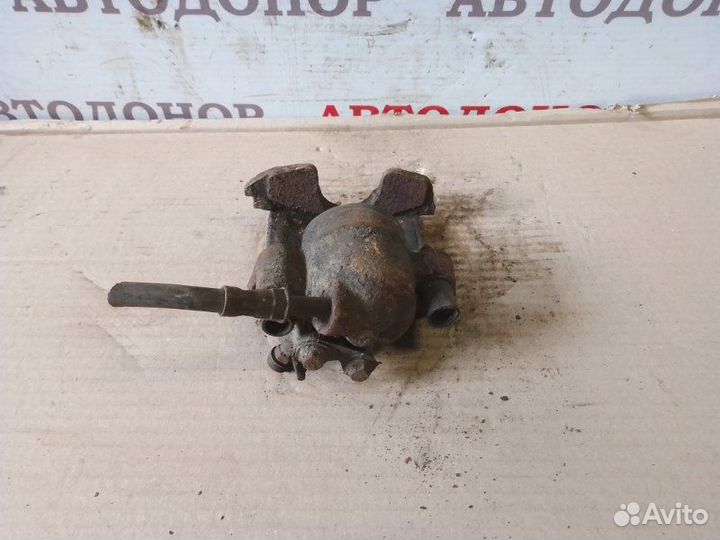 Суппорт тормозной передний левый Volkswagen Golf 3