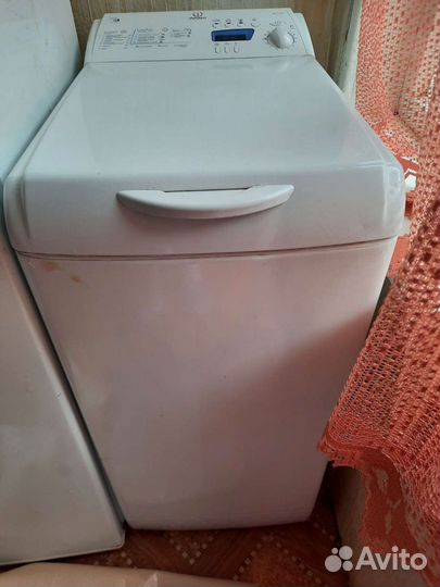 Стиральная машина с вертикальной загрузкой