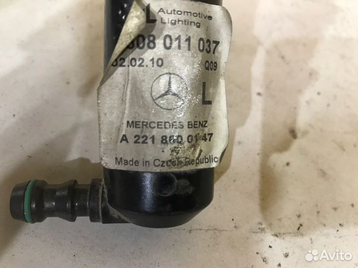 Форсунка омывателя фар передняя левая