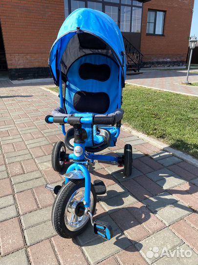 Трехколесный велосипед с ручкой