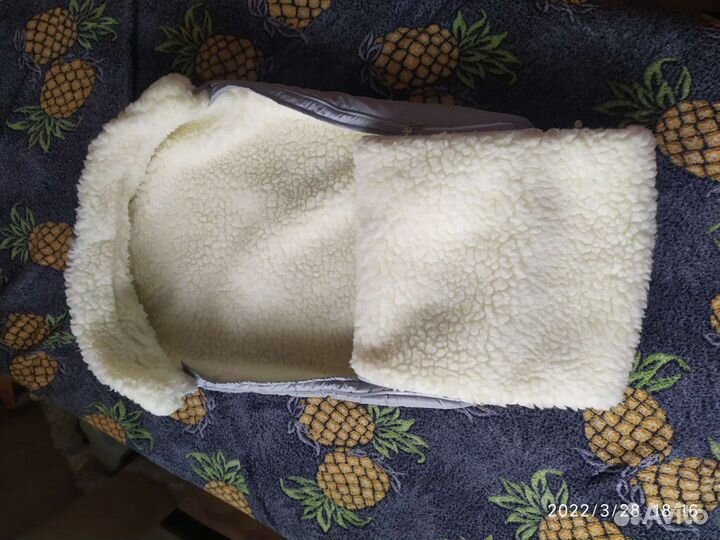 Меховой конверт в коляску