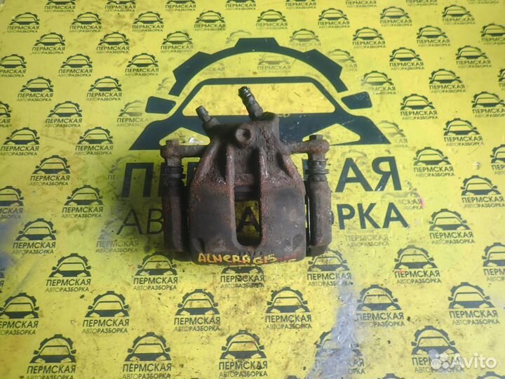 Суппорт передний правый Nissan Almera G15