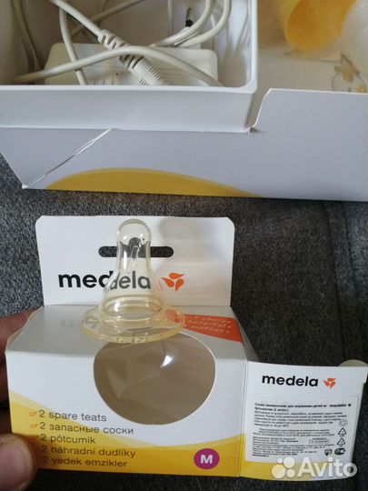 Молокоотсос medela электрический