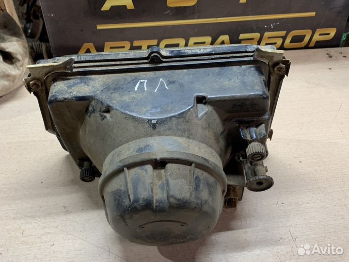 Фара левая волга 3102