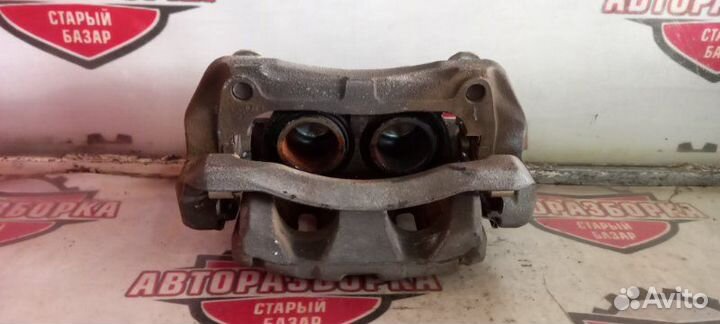 Суппорт тормозной передний правый Honda Cr-V RM4