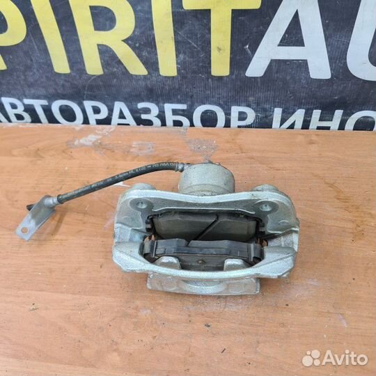 Суппорт тормозной передний левый Kia Cerato 4