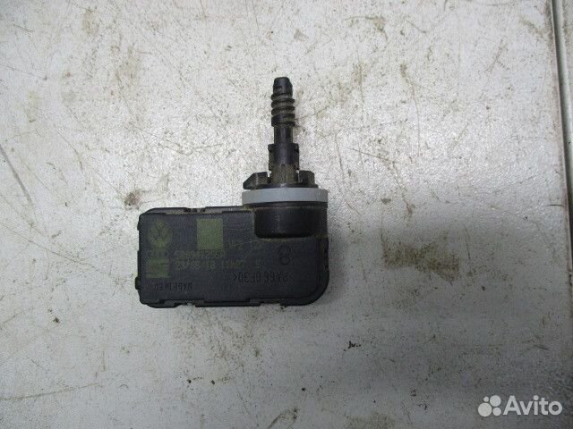 Моторчик корректора фары Skoda Rapid