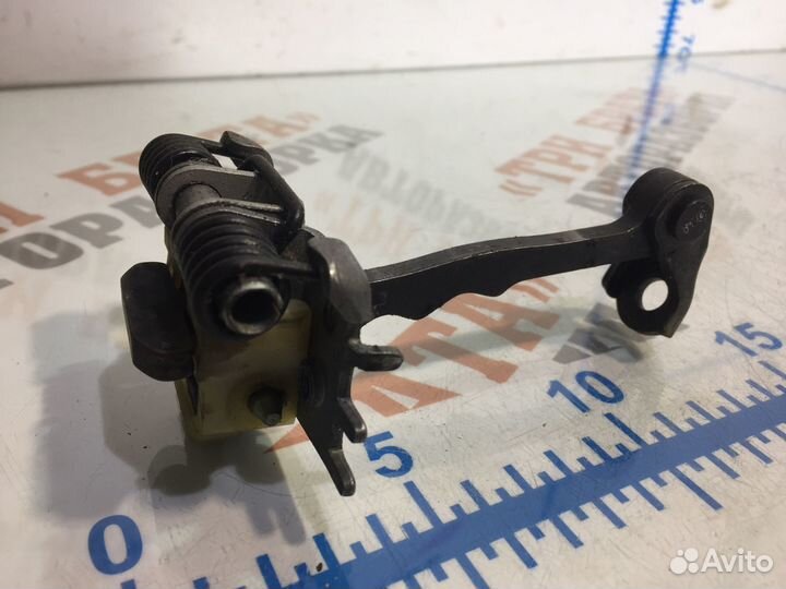 Рено Ограничитель открытия передней двери Прав