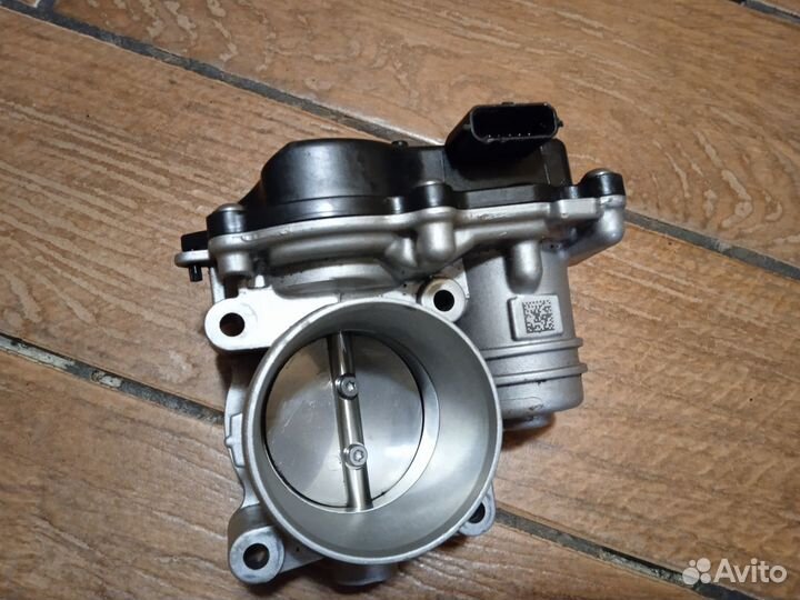 Тросельная заслонка