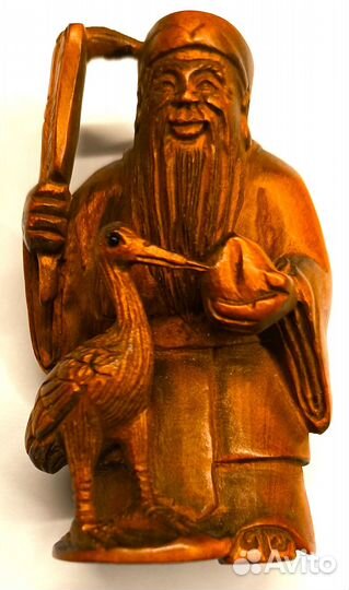 Звездный старец Шоу Син с цаплей и персиком. Нэцке