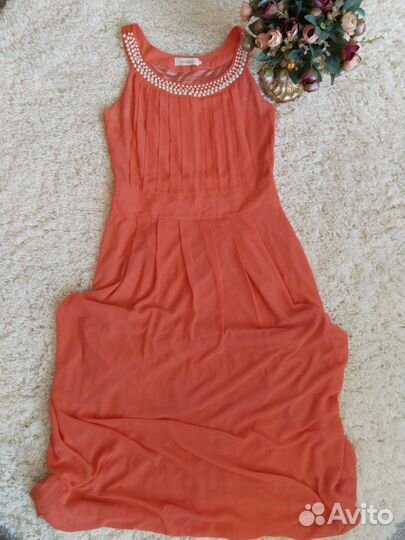 Пакетом вечерние платья, кардиган и.т.д