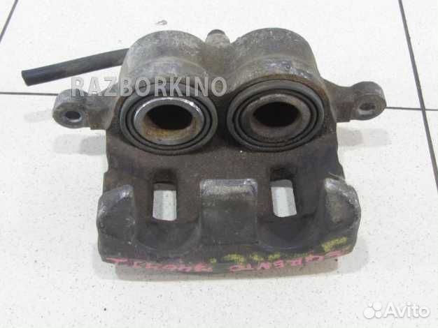 Суппорт передний левый Киа