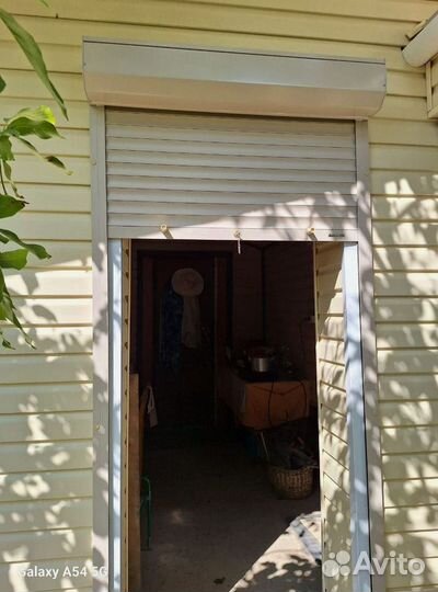 Гаражные ролетные ворота с установкой