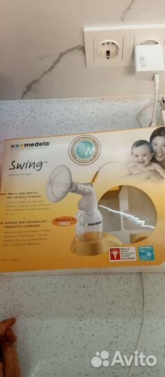 Молокоотсос medela swing электрический