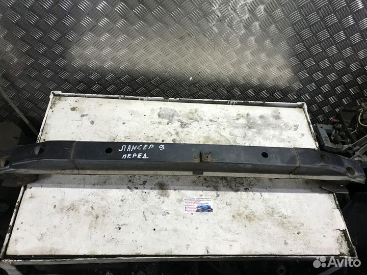 Усилитель переднего бампера Митсубиси Лансер 9