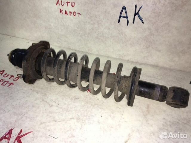 Аммортизатор стойка задний левый Mitsubishi Lancer