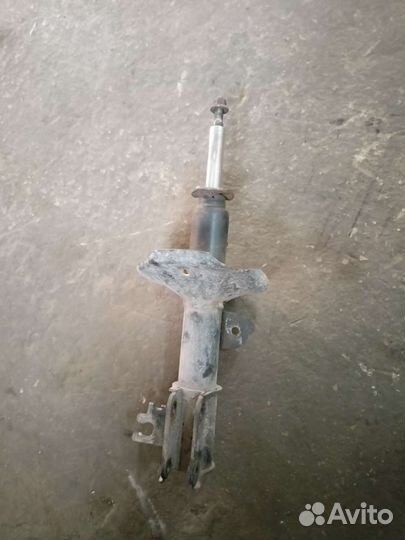 Амортизатор передний левый Лачетти