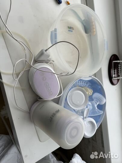 Молокоотсос и стерилизатор