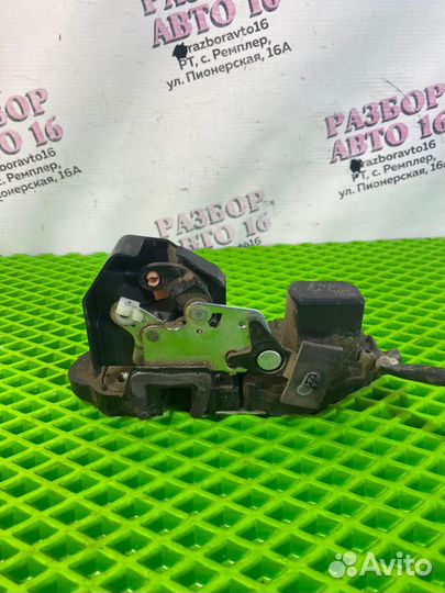 Задний левый замок двери KIA Spectra