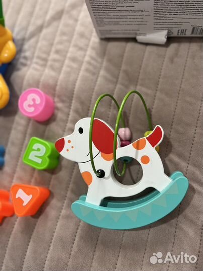 Игрушки каталки пакетом для малыша