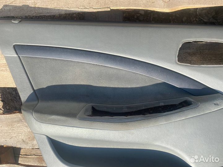 Обшивка двери передняя левая Chevrolet Lacetti