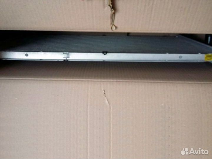 Радиатор охлаждения двигателя Санг Енг Актион 2011