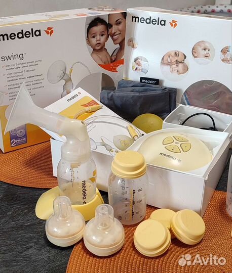 Молокоотсос Medela swing электрический + бутылочки