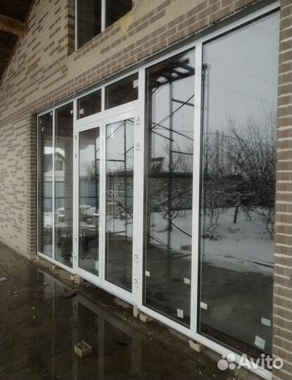 Пластиковые окна и двери остекление балконов