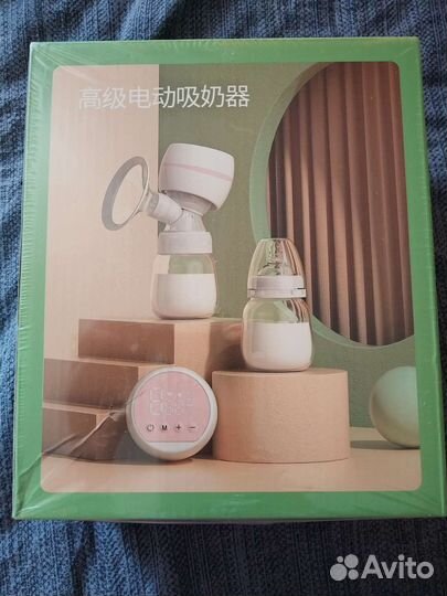 Молокоотсос электрический новый