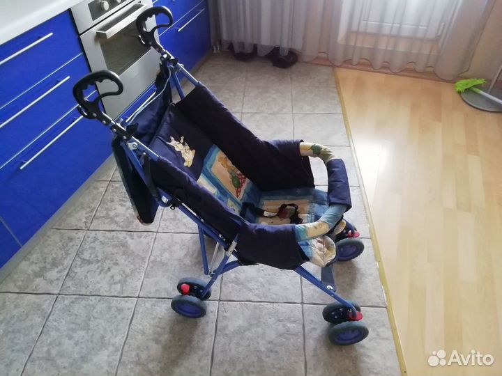 Прогулочная коляска трость