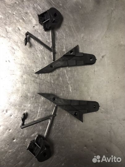 Крепление фары верх/низ Opel Astra H