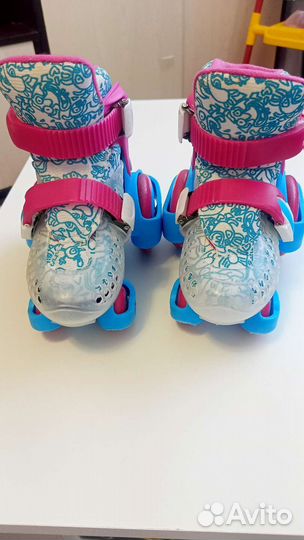 Роликовые коньки