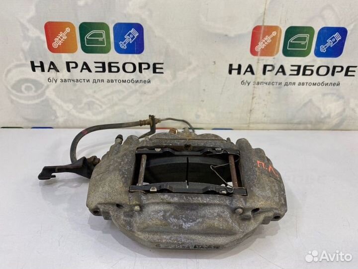 Суппорт передний левый Toyota Land Cruiser 200