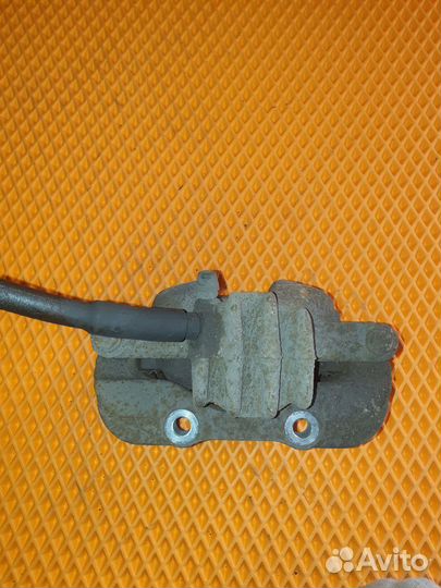 Суппорт тормозной передний левый Peugeot 308