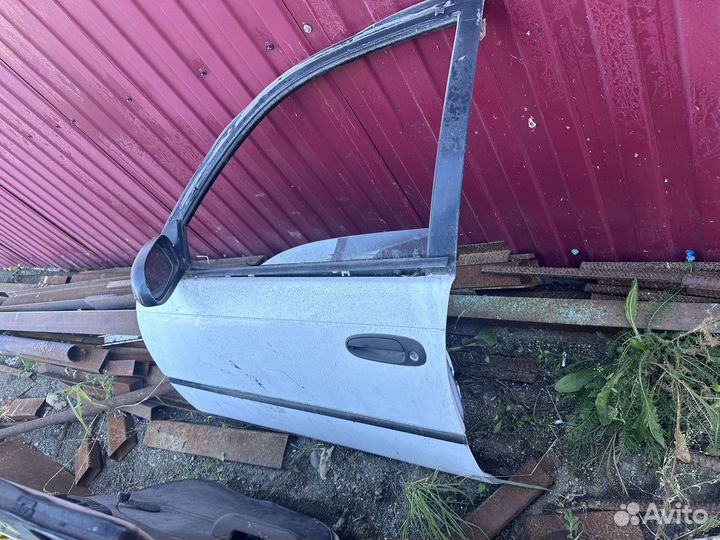 Дверь на corolla