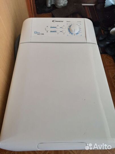 Стиральная машина с вертикальной загрузкой Candy