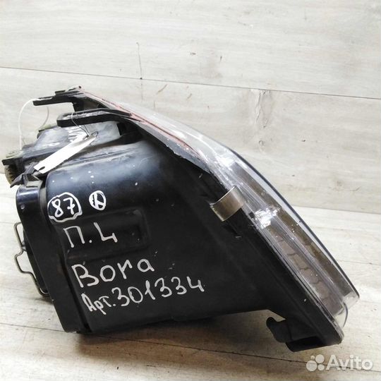 Фара левая Volkswagen Bora