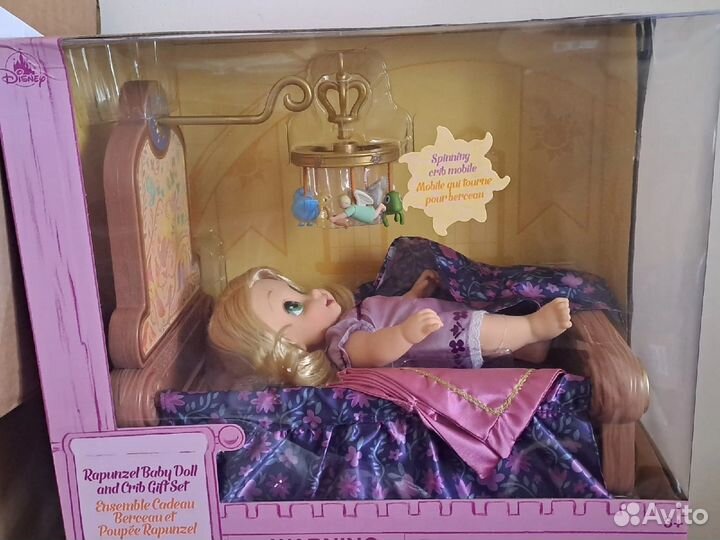 Малышка Рапунцель в колыбельке
