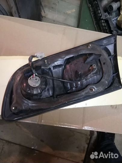 Фара Toyota Caldina левая задняя