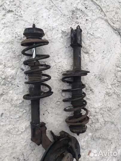 Рено Логан передние стойки и Пружины