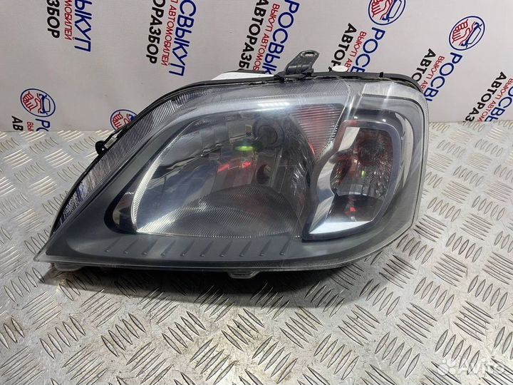 Фара левая Renault Logan