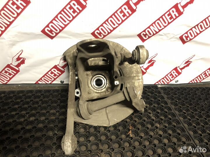 Кулак заднего левого колеса в сборе с ступицей BMW