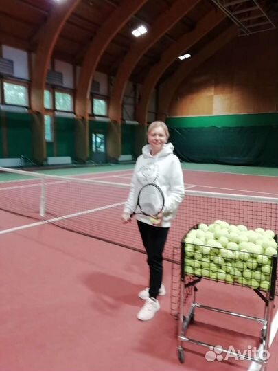 Тренер по большому теннису