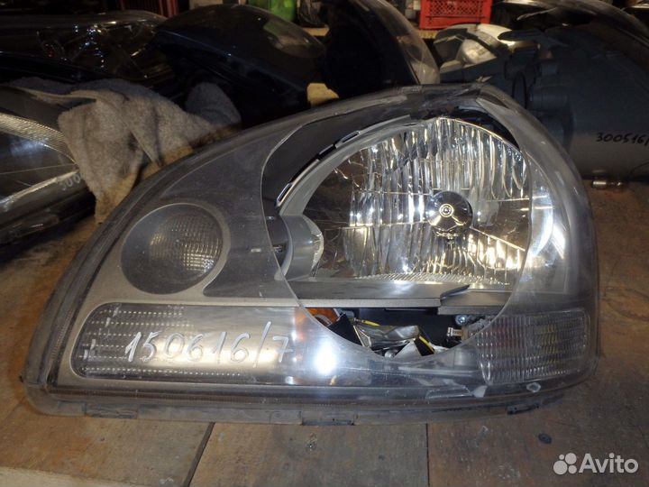 Фара левая Tucson 2004-2010