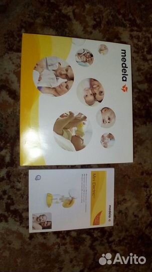 Молокоотсос Medela mini electric