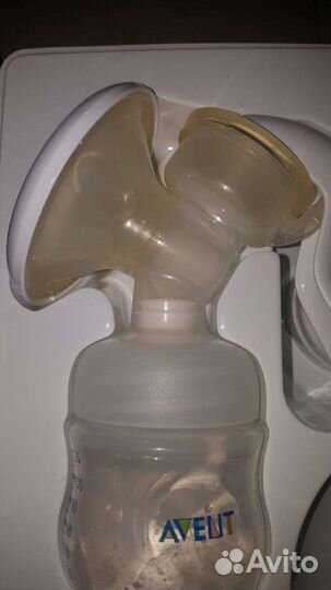 Молокоотсос Авент ручной и вкладыши для груди