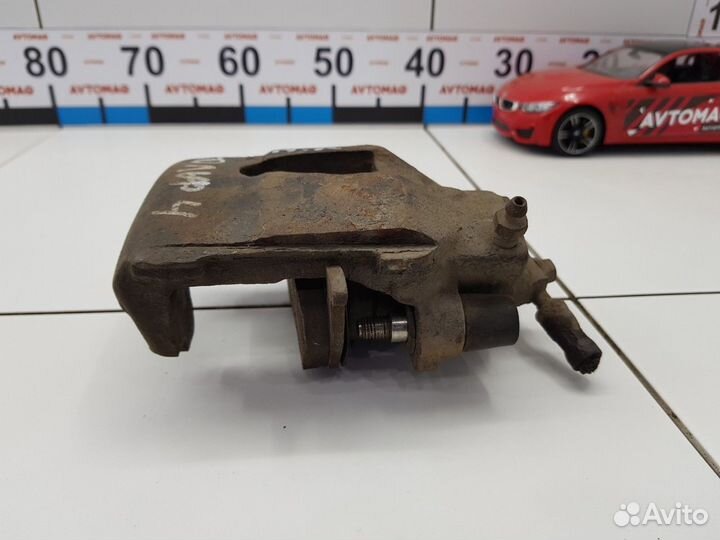 Суппорт передний левый