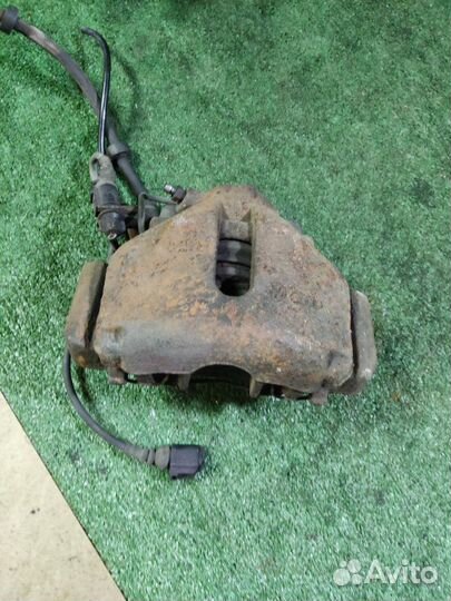 Суппорт тормозной передний левый Audi A6 C6